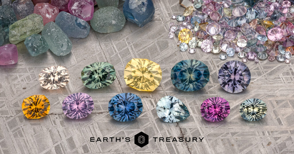 A variety of round cut gemstones in multiple colors are arranged on a metallic surface, with rough and smaller faceted gems in the background. "EARTH'S TREASURY" and "Stacked from 53 images. Method=B (R=11,S=7)" appear at the bottom.