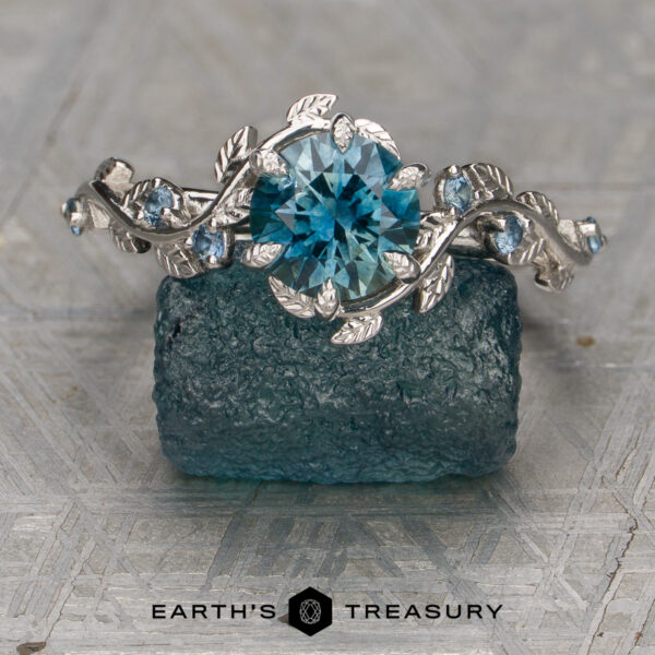 The Aralia Ring featuring a 1.30-Carat Teal Montana Sapphire set in platinum the aralia ring featuring a 1.30-Carat Teal Montana Sapphire set in platinum