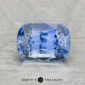 A 3.13-carat Ceylon sapphire, cushion-cut in a rectangular shape, displayed on a textured surface with "EARTH'S TREASURY" shown below.