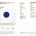The JV-001-738K-G GIA Report details a deep blue round sapphire from Sri Lanka, including its origin, characteristics, cutting style, and a description of its color and appearance.