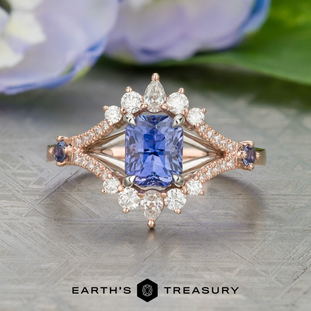 The "Stacked from 21 images. Method=B (R=7,S=2)" ring features a rectangular blue gemstone with white and blue accent stones set in rose gold, displayed on a patterned surface with “Earth’s Treasury” branding below.