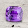 A 3.06-carat rectangular cushion-cut Ceylon Sapphire with a pinkish purple hue rests on a textured light surface, with the "EARTH'S TREASURY" text and logo displayed below the stone.
