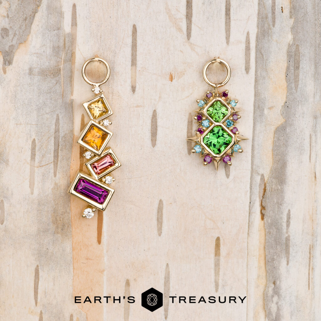 Mielke, Christine 6 [custom gallery]: Two ornate gemstone earrings—one features yellow, orange, and purple stones in a vertical row; the other displays green and purple stones in a clustered design. Earth's Treasury logo below.