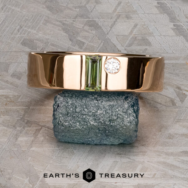 Stacked from 52 images. Method=B (R=1,S=3)" ring with a vertical green gemstone and a round white diamond rests on a rough blue-green stone; "Earth's Treasury" logo appears at the bottom.