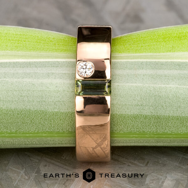 Stacked from 41 images. Method=B (R=1,S=3) A gold ring with a small round diamond and a rectangular green gemstone set in the center, displayed on a green and white striped surface. "Stacked from 41 images. Method=B (R=1,S=3)" logo appears at the bottom.