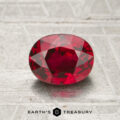 A 1.30-carat oval-cut ruby is displayed on a textured metallic surface, with the "Earth's Treasury" logo beneath it.