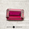 A 1.13-carat faceted ruby is shown on a textured surface with the "Earth’s Treasury" logo beneath it.