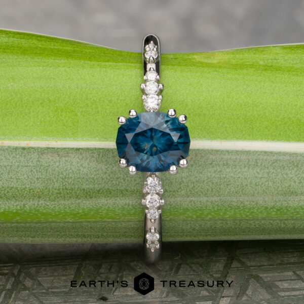 The “Blythe” Diamond-Accented Solitaire with 1.53-Carat Teal Blue Montana Sapphire (Heated) The “Blythe” Diamond-Accented Solitaire with 1.53-Carat Teal Blue Montana Sapphire (Heated)