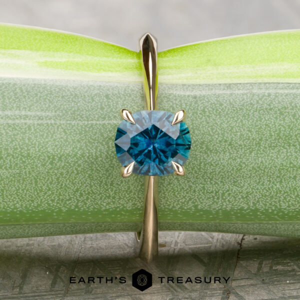 The “Lyra” Solitaire With 1.33-Carat Rich Teal Montana Sapphire (Heated) The “Lyra” Solitaire With 1.33-Carat Rich Teal Montana Sapphire (Heated)